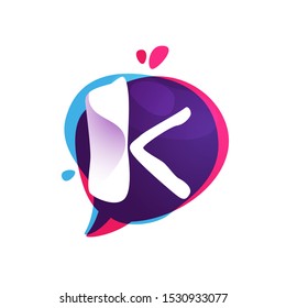 K letter chat app logo at colorful watercolor splash background. Color multiply style. Bubble speech vector typeface for labels, headlines, posters, cards etc.