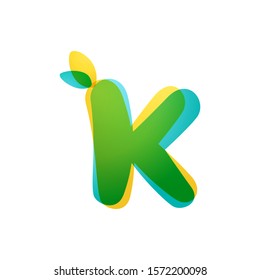 K letter eco logo. Overlapping gradient font with green leaves. Vector green template can be used for eco, vegan, bio, raw, organic.