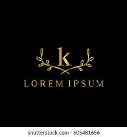 k letter golden branches vector logo design template