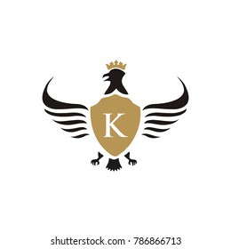 K letter heraldic logo vector illustration with wings gold color 