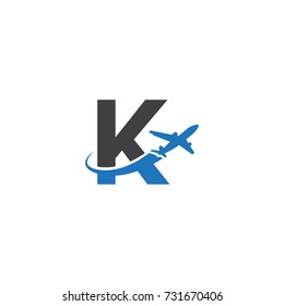 K letter logo with airplane