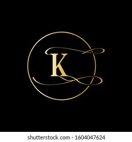 K letter logo with black background.This is a golden frame letter logo.K letter icon.
