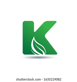 K Letter logo with leaf symbol. Green leaf logo vector template. .