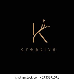 K LETTER LOGO LUXURY WITH DRAWING LEAF