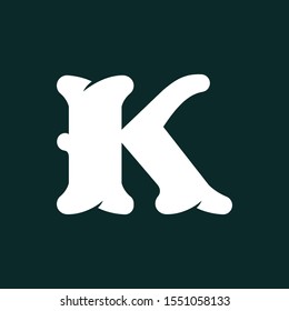 K letter logo made of bones. Vector flat style font for horror labels, posters etc.