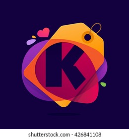 K letter logo with Sale tag heart and splashes. 