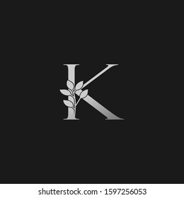 K Letter Logo Silver Classy Vintage  Nature Floral Branch Silhouettes Vector Design Initial Concept.