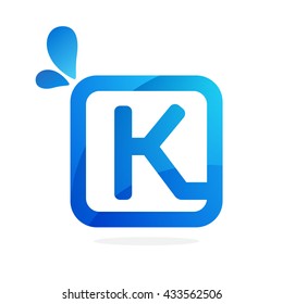 K letter logo in square with blue drops. 