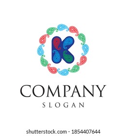 K letter with paisley pattern round colored in red green blue circle sign symbol vector