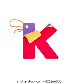 K letter with paper folded corner and sale tag. Vector paper style typeface for best price tag. Sale sticker icon for card, special offer tag, corporate identity, label or poster.