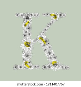 K letter symbol with chamomile flower pattern