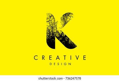 K Logo Letter Made From Black Tree Branches. Tree Letter Design with Minimalist Creative Style.