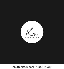 K M KM Initial letter handwriting and signature logo.	