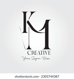 K M Logo design copmany name on White and grey background