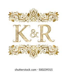 K and R vintage initials logo symbol. The letters are surrounded by ornamental elements. Wedding or business partners monogram in royal style.