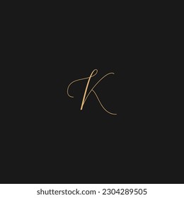 K Script Letter Logo Design with gold color.
