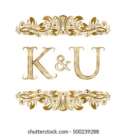 K and U vintage initials logo symbol. The letters are surrounded by ornamental elements. Wedding or business partners monogram in royal style.