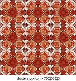 Kaleidoscope elements. Seamless motley pattern with oriental mandalas in red, brown and orange colors. Vector hippie mandala. Fabric, wallpaper or wrap print.