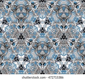 Kaleidoscope seamless pattern. Composed of color abstract elements. Useful as design element for texture and artistic compositions.