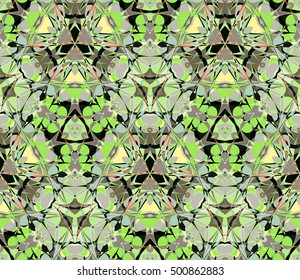Kaleidoscope seamless pattern. Composed of color abstract shapes. Useful as design element for texture and artistic compositions.