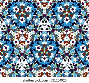 Kaleidoscope seamless pattern. Composed of color abstract shapes located on a white background. Useful as design element for texture and artistic compositions.