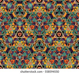 Kaleidoscope seamless pattern. Composed of color abstract shapes. Useful as design element for texture and artistic compositions.