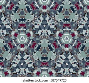 Kaleidoscope seamless pattern. Composed of color abstract shapes. Useful as design element for texture and artistic compositions.