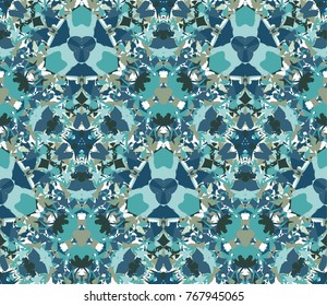 Kaleidoscope seamless pattern. Composed of colored abstract shapes located on white background. Useful as design element for texture and artistic compositions.
