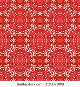 Kaleidoscopic seamless pattern in red, orange and white colors. It can be used in the design of textiles, in the printing industry. Vector illustration.