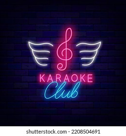 Karaoke Club Neon Signboard On Brick Wall. Treble Clef With Wings Emblem. Night Logotype. Talent Show. Light Sign. Label For Party. Glowing Effect Banner. Vector Stock Illustration