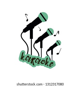 Karaoke emblem with three big, smaller and smallest green and black microphones with an inscription isolated on white