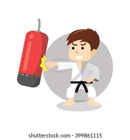 Karate boy punching sand sack