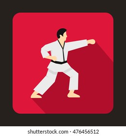 Karate fighter icon in flat style on a crimson background