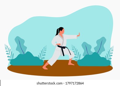 Karate girl training in the nature park