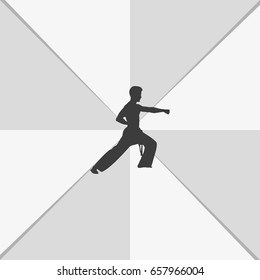 Karate kick silhouette.