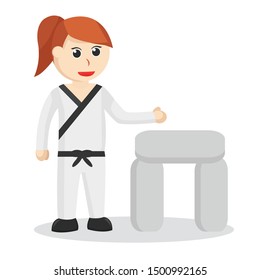 Karate woman Doing Breaking rock Technique