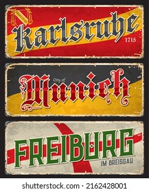 Karlsruhe, Munich and Freiburg city travel plates and stickers, Germany regions vector tin signs. German state cities travel plates with landmarks and region flags of Bavaria and Baden Wurttemberg