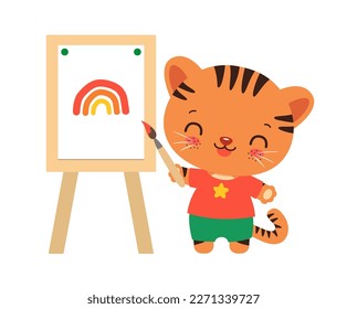 Kawaii tiger. Cute tiger cub artist drawing with paint brush and easel. Art studies school subject sign. Funny student cute cartoon tiger. Kawaii animal holding brush standing by the easel smiling.