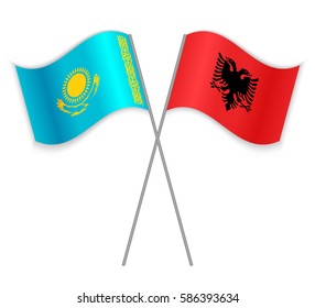Kazakh and Albanian crossed flags. Kazakhstan combined with Albania isolated on white. Language learning, international business or travel concept.
