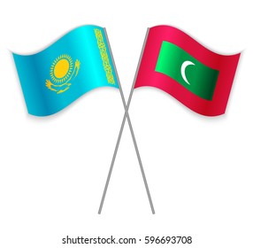 Kazakh and Maldivian crossed flags. Kazakhstan combined with Maldives isolated on white. Language learning, international business or travel concept.