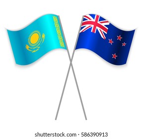 Kazakh and NZ crossed flags. Kazakhstan combined with New Zealand isolated on white. Language learning, international business or travel concept.
