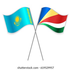 Kazakh and Seychellois crossed flags. Kazakhstan combined with Seychelles isolated on white. Language learning, international business or travel concept.