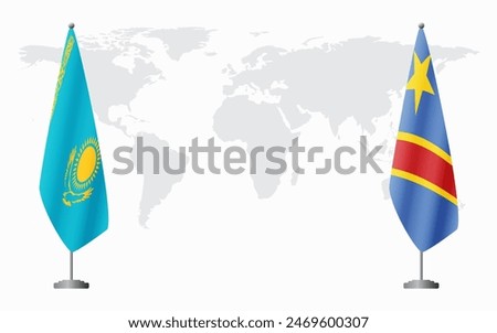 Kazakhstan and Democratic Republic of Congo flags for official meeting against background of world map.