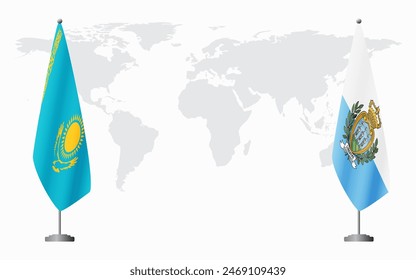 Kazakhstan and San Marino flags for official meeting against background of world map.