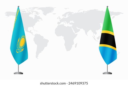 Kazakhstan and Tanzania flags for official meeting against background of world map.