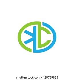 KC initial letters looping linked ellipse logo blue green