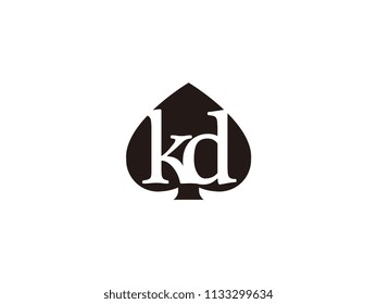 The kd initials logo inside the black shovel