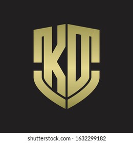 KD Logo monogram with emblem shield shape design isolated gold colors on black background