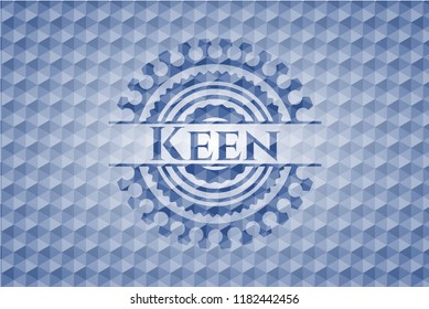 Keen blue badge with geometric pattern background.