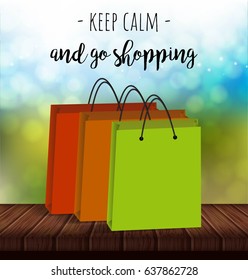 Keep calm and go shopping. Vector lettering with paper bags on summer background
